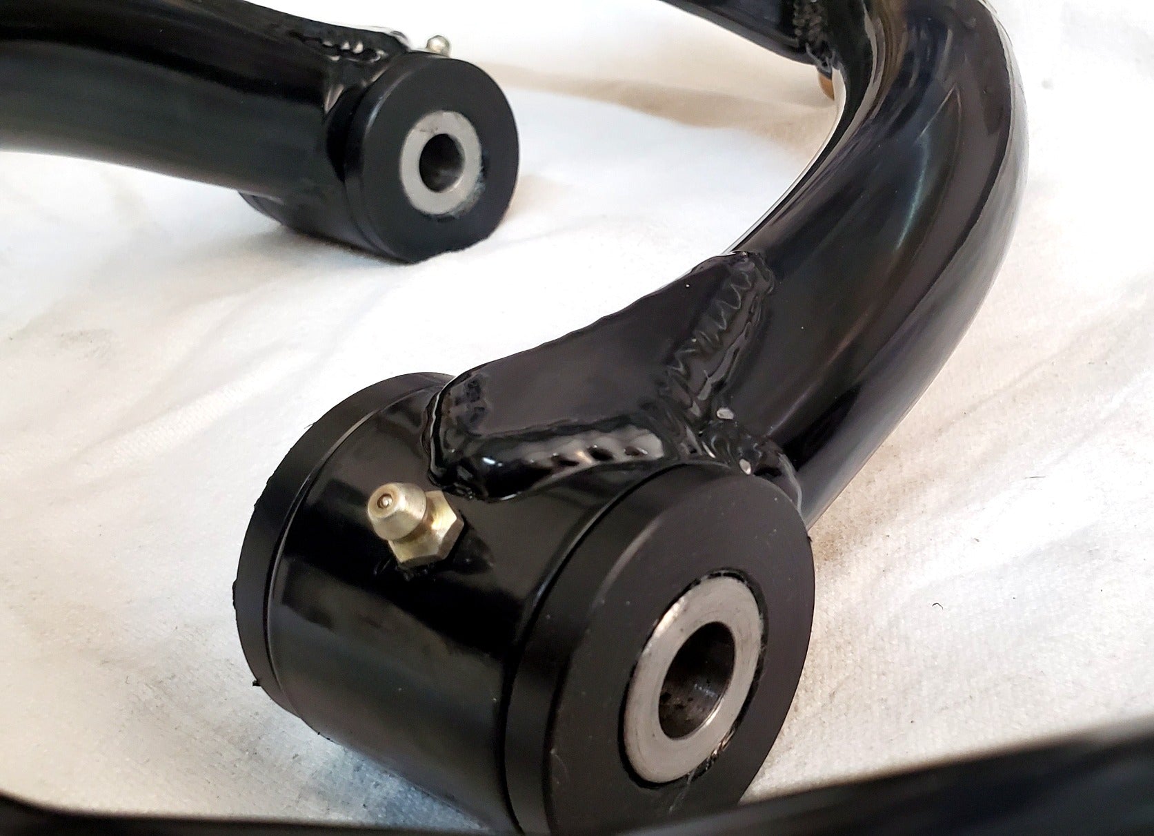2WD Upper Control arms Delrin image 1